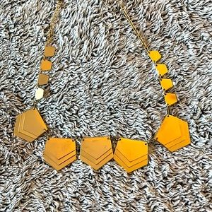 Fashion necklace in gold. Perfect for a casual or dressy night out.